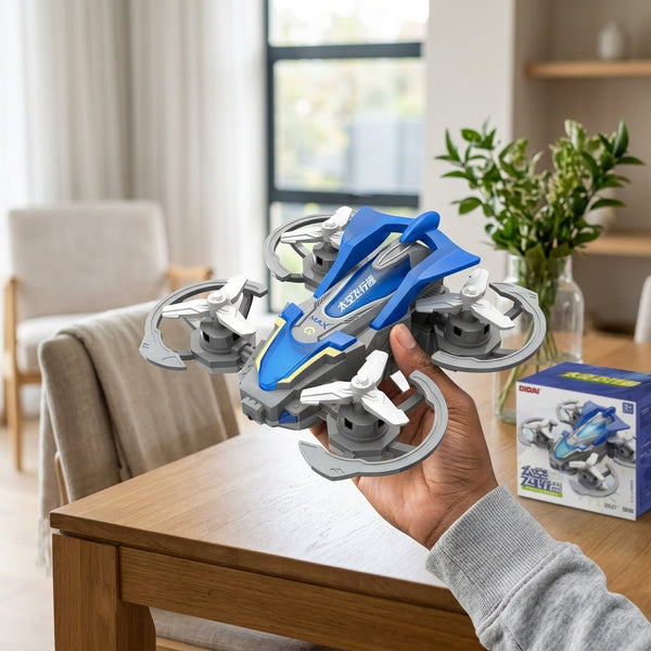 Person holding a Rotating Aircraft Friction Inertia Stunt Car in a modern living room setting.