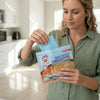 Woman using Multi-Effect Eco-Friendly Hard Floor Wipes in a modern kitchen for easy cleaning.