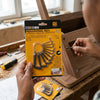 10 Piece Keychain Hex Key Allen Wrench packaging displayed with user assembling furniture.