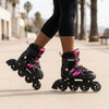 Adjustable 4 Wheel Inline Roller Skates in black and pink, showcasing stability and style for young skaters.