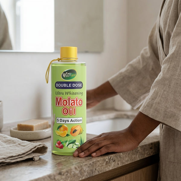 Double Dose Molato Skin Brightening Oil bottle on a bathroom counter with a hand reaching for it.