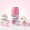 Antiperspirant Deodorant Cream with pink cap and floral design on a pastel background.