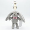 Necktie Rabbit Plush Keychain Pendant with a soft gray rabbit and pink bow tie, perfect for decorating bags.