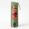Mini USB Rechargeable Portable Blender with fruits inside, perfect for making smoothies on the go.