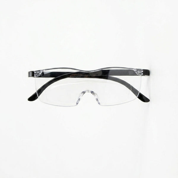 Magnifying Eyewear with Transparent Display Box on a white background, showing clear lenses and a sleek design.