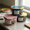 2300ml Leakproof Airtight Plastic Food Container in pink, teal, and yellow with colorful fruit and vegetables.
