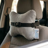 Ergonomic Memory Foam Car Headrest Pillow attached to a car seat for neck support during commutes.