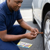 Person using Tubeless Tire Repair Rubber Fixing Strips 10s to fix a punctured tire.