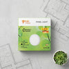 6W Round LED Surface Panel Light packaging on a blueprint background with a succulent plant.
