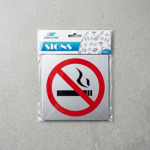 No Smoking Sign in packaging, featuring a clear graphic of a cigarette crossed out, promoting smoke-free spaces.