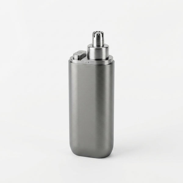 Rechargeable Mini Nose and Ear Hair Trimmer in sleek silver design, perfect for grooming on the go.
