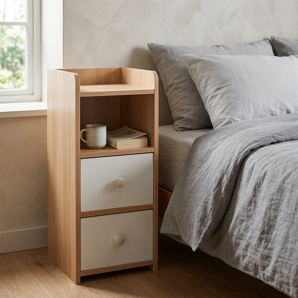 Contemporary Wooden Bedside Table with 2 Drawers beside a bed, featuring two drawers and an open shelf for storage.