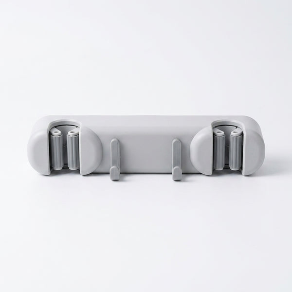 Wall Mounted 3 Hook Mop and Broom Hanging Rack in gray, designed for organizing cleaning tools.