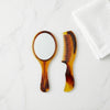 Classic Mirror and Comb Grooming Set featuring a stylish tortoiseshell-look finish on a white background.