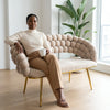 Modern Bubble Bench Upholstered Indoor Seating with a woman holding a cup, showcasing contemporary design and comfort.