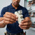 Solar PV Fuse 32A 1000V DC held by a technician during solar installation.