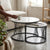 Round Marble-Top Nesting Coffee Tables with Black Metal Base in a living room setting, showcasing flexibility and style.