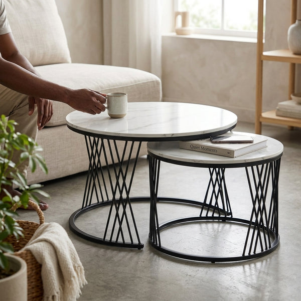 Round Marble-Top Nesting Coffee Tables with Black Metal Base in a living room setting, showcasing flexibility and style.