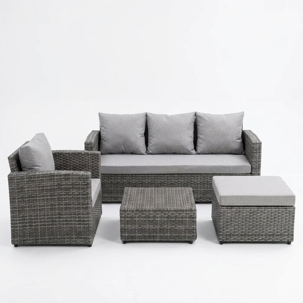 4 Piece PE Wicker Outdoor Patio Furniture in Grey with sofa, armchair, ottoman, and coffee table.