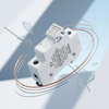 DC Circuit Breaker 32A High Voltage Protection Switch displayed with wires and glass fragments in a modern setting.
