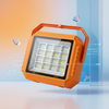 Portable Multi-Chip Solar Emergency Light in vibrant orange with multiple LEDs for bright illumination.
