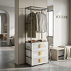Single Row Clothes Storage Rack with Drawers showcasing hanging clothes and enclosed storage space.