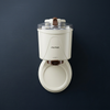 Compact Ice Cream Machine with a sleek design and transparent lid, perfect for homemade frozen desserts.