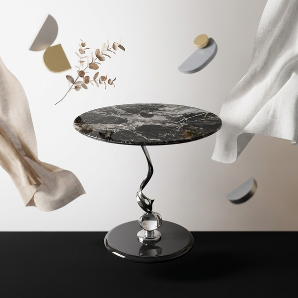 Sculptural Marble-Look Round Side Table with a black marble top and artistic base in a stylish setting.