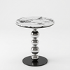 Round Marble-Look Coffee Table with Decorative Metal Base showcasing a modern design with a stylish marble top.