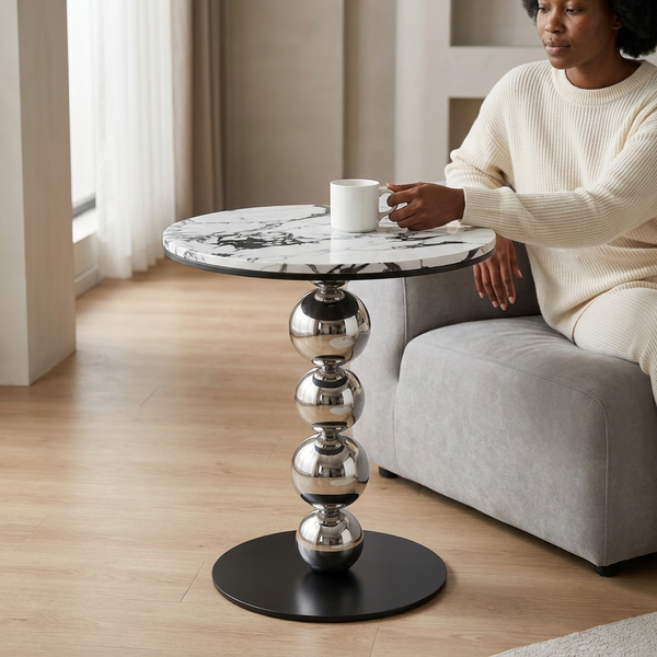 Round Marble-Look Coffee Table with Decorative Metal Base, featuring a sleek marble top and stylish metal support.
