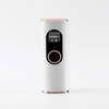 Electric Hair Removal Device with Digital Display, compact handheld design with integrated control area.