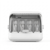 Automatic Baby Bottle Sterilizer and Dryer with multiple bottles inside and transparent lid.