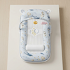 Portable Baby Lounger with Hanging Toy Arch featuring soft designs and a safety harness for comfort.