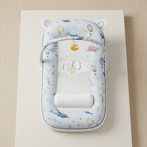 Portable Baby Lounger with Hanging Toy Arch featuring soft designs and a safety harness for comfort.