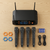 4-Channel Professional Wireless Handheld Microphone System including four microphones and receiver on wooden surface.