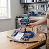 High-Pressure Electric Airless Paint Sprayer Kit with accessories on workbench, ideal for professional and DIY projects.