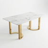 Modern White Marble-Look Dining Table with Gold Legs on a white background, featuring a glossy marble tabletop and polished gold legs.