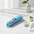 Professional Cordless Men's Beard and Hair Trimmer Kit displayed on a marble surface with decorative elements.