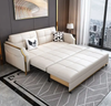Convertible Sleeper Loveseat Sofa Bed in a modern design, shown in white, transforming into a flat sleeping surface.