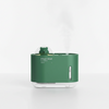 Bear Design Mini USB Humidifier with bear top and mist, perfect for desk use and indoor spaces.