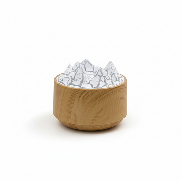 Aromatherapy Machine for Home & Office with a wooden base and white, mountain-like top design.