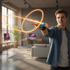 A young boy using a Kids Spider Web Shooter Wrist Launcher Toy Glove Set in a modern living room.