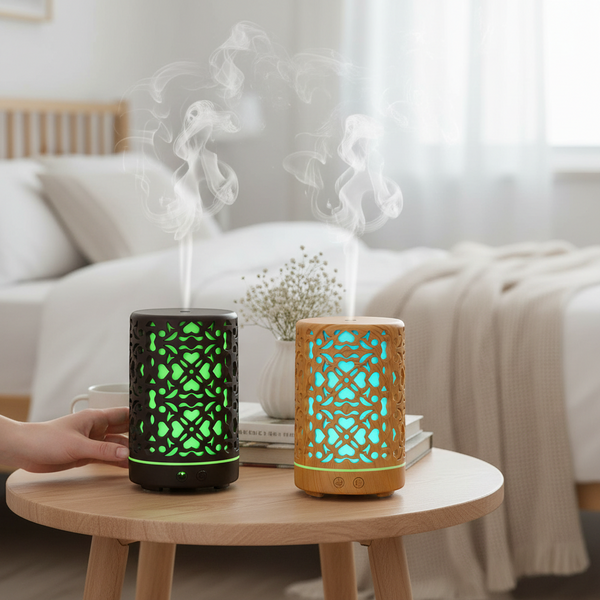 Compact Home & Office Air Humidifier on a table with steam rising, enhancing indoor air moisture in a cozy room.