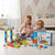 Children playing with the Magnetic Vehicle Track Toy Set, featuring colorful track pieces and accessories.