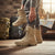 Mens Tactical Side Zip Work Boots worn in a rustic room with backpacks and a map, showcasing their practical design.
