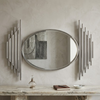 Luxury Oval Wall Mirror surrounded by sleek metallic accents, enhancing modern interior elegance.