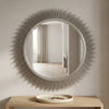 Stylish Sunburst Decorative Round Wall Mirror adding elegance and light reflection to a modern interior design.
