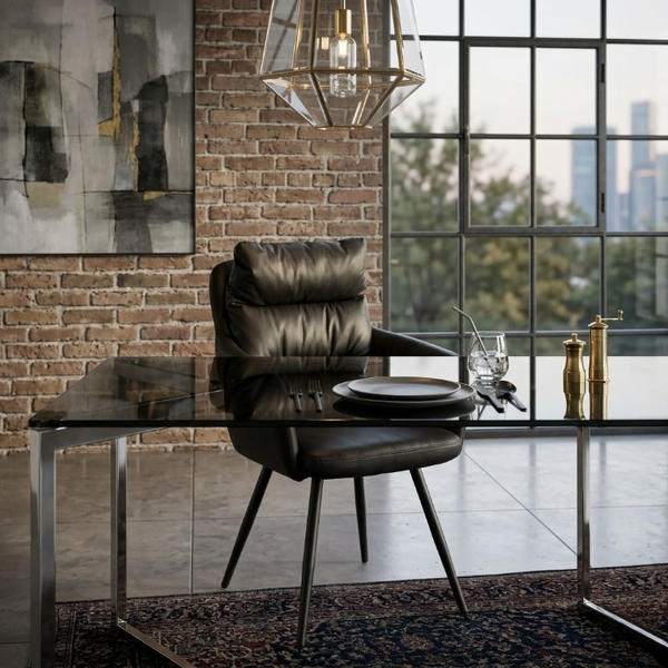 Elara Modern Armchair placed at a sleek glass dining table in a stylish interior setting.