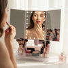 360-Degree Rotating TriFold Makeup Mirror with LED & Storage being used for makeup application.