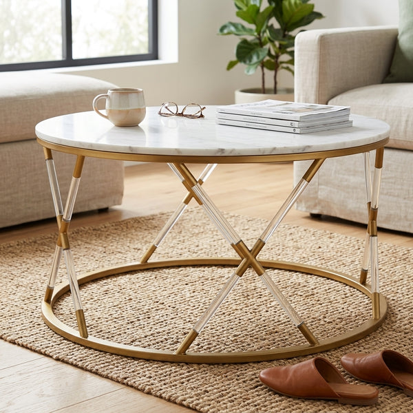 Round Marble Top Coffee Table with gold accents and clear legs in a cozy living room setting.